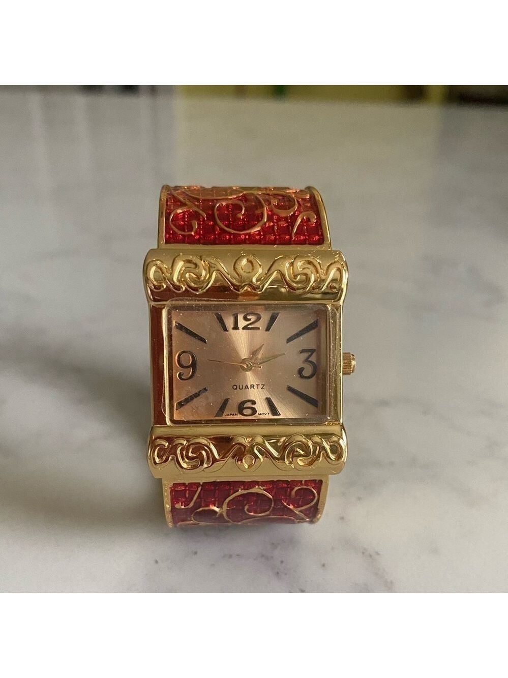 Avon Gold Tone and Red Enamel Scroll Design Hinge Cuff Watch